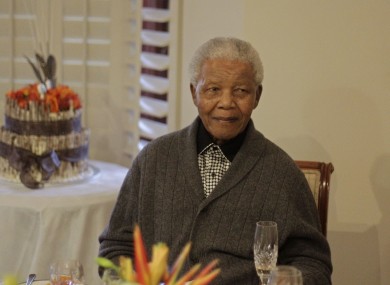 Former South African President Nelson Mandela celebrating his 94th birthday in Qunu, South Africa, on 18 July, 2012 (file photo).