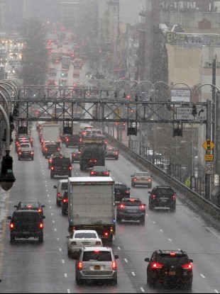 Morning rush hour traffic makes its way over the Williamsburg bridge into Manhattan.