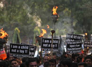 Activists protest against the rape of another young girl (5) in New Delhi, India.