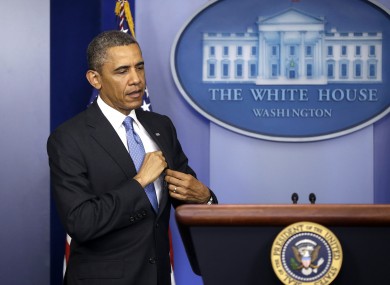 President Barack Obama returns to the podium to answer an additional question during his new conference in the Brady Press Briefing Room.