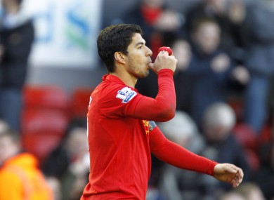 Liverpool's Luis Suarez celebrates scoring his teams second goal of the game.