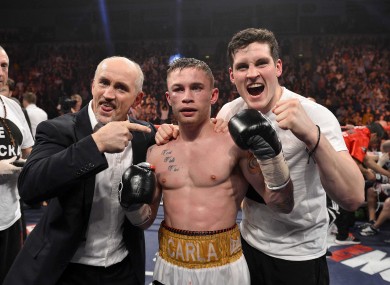 Frampton celebrates his European title win with Barry McGuigan, left, and trainer Shane McGuigan.