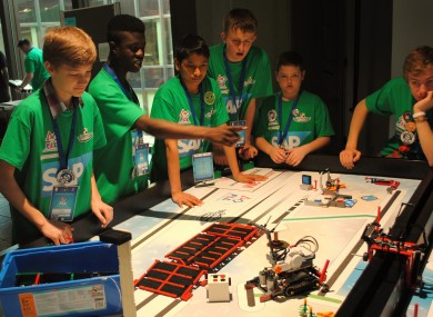Team members Vlad Medves, Jonathan Toah, Himanshu Singh, Daire Hennessy, Luke Whelan and Jakub Palusinski watch their robot in action.
