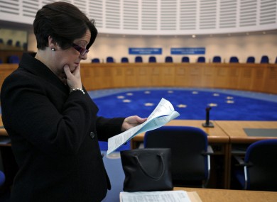 Carmel Stewart, a lawyer for A, B and C, reads the European Court of Human Rights' ruling in the case in December 2010.