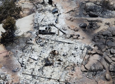 The aftermath of the Arizona fire in which 19 firefighters lost their lives.