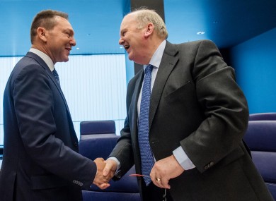Ireland's Finance Minister Michael Noonan, right, greets Greece's Finance Minister Yannis Stournaras during a meeting last month.