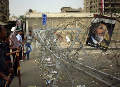 Supporters of ousted President Mohammed Morsi protest at the Republican Guard building in Cairo