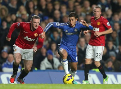 Wayne Rooney chases Eden Hazard at Stamford Bridge.