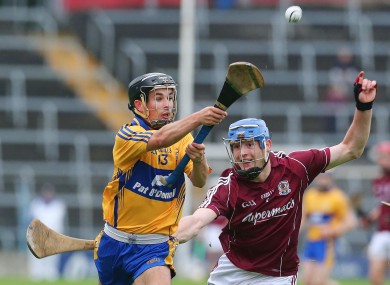 Galway's Barry Keane and Cathal O'Connell of Clare fight for possession during the first half of their All-Ireland U21 hurling semi final.