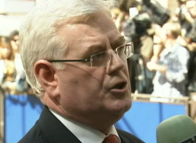 Eamon Gilmore speaking to the media in Brussels today