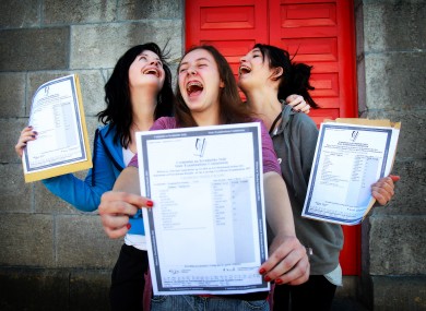 Three students with their results outside Mercy Heights Secondary School in Skibbereen in Cork in August 2011