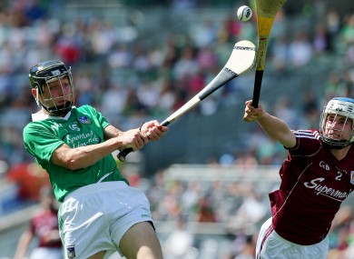 Limerick's Pat Ryan and Madhc O'Conghaile of Galway