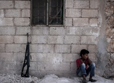 A Syrian child pictured yesterday in a village in the Idlib province.