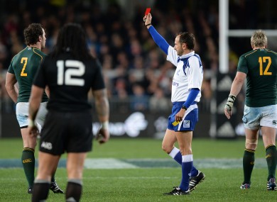 Romain Pite flashes the red card at Bismarck du Plessis.