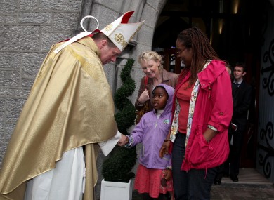 Bishop Francis Duffy meeting his congregation.