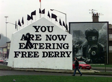 Black flags for each of the victims of Bloody Sunday fly over Free Derry Corner in Derry, 1998.