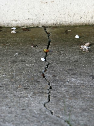 A crack in the ground outside a pyrite affected home in Dunshaughlin.