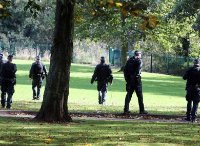 Police Forensic officers examine the scene close to the spot were Kearney was shot dead.