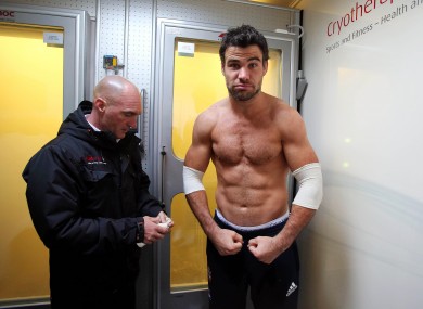 Cold shoulder: Mike Phillips prepares for a cryotherapy session while on Lions duty in May of this year.