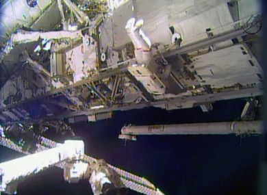 Rick Mastracchio works outside the International Space Station during the first of a series of spacewalks to replace a degraded ammonia pump module.