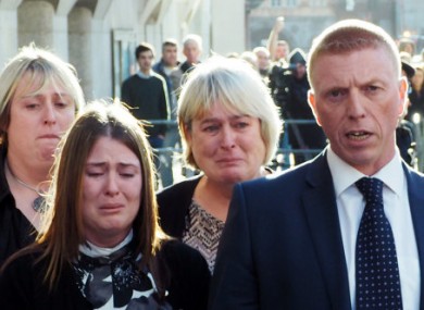 Rebecca Rigby (second left), the wife of murdered Lee Rigby, weeps as a statement is read out by Detective Inspector Pete Sparks (right) outside the courthouse.