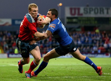 Keith Earls evades Rob Kearney earlier this season at Thomond Park.