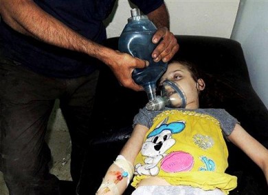 A girl is treated for injuries inflicted by chemical weapons on 21 August in Ghouta.