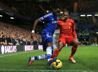 Chelsea's Samuel Eto'o (left) and Liverpool's Glen Johnson (right) in action.