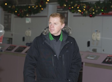 Celtic manager Neil Lennon at Glasgow Airport ahead of their Champions League tie.