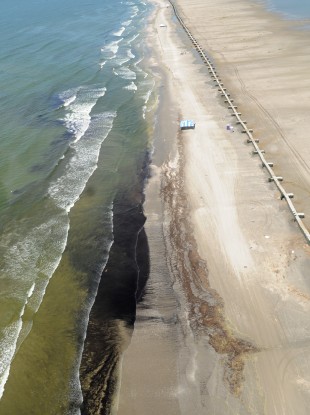 Crude oil washes up onto Fourchon Beach in the US in 2010.