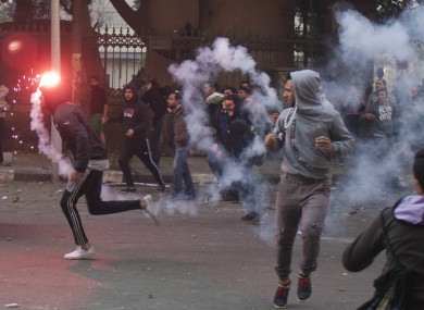 Egyptian anti-military protesters, mostly supporters of ousted Islamist President Mohammed Morsi, clash with security forces in downtown Cairo