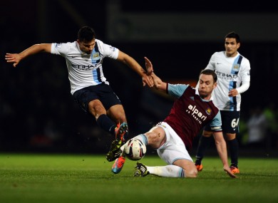 Manchester City's Sergio Aguero and West Ham United's Kevin Nolan.