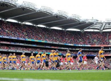 Cork and Clare players before last year's All-Ireland hurling final.
