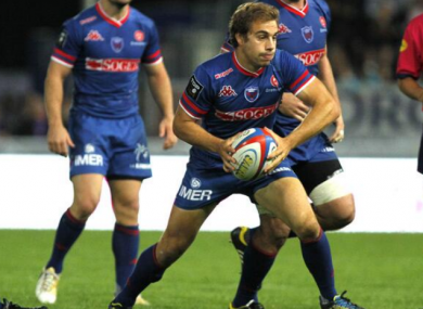 James Hart starts another backline move for Grenoble.