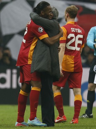 Drogba and Mourinho hug after Real Madrid and Galatasaray met in the competition last year.