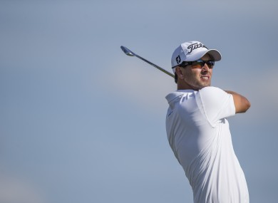 Adam Scott tees off on the 14th hole during the third round of the Arnold Palmer Invitational golf tournament.