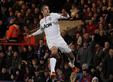 Van Persie celebrates his goal against Crystal Palace.