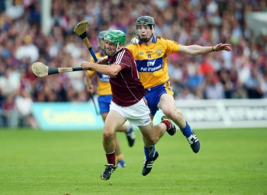 Galway's David Burke and Clare's Tony Kelly.