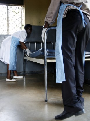 Medical personnel prepare an isolation unit to care for Ebola victims