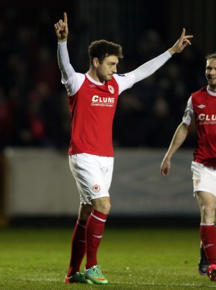 Pat's striker Mark Quigley celebrates scoring.