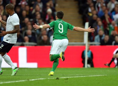 Shane Long celebrates his goal against England.