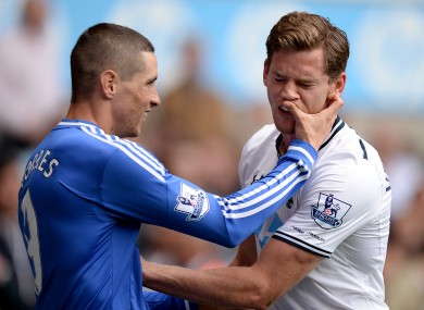 Fernando Torres pokes Spurs defender Jan Vertonghen back in September.