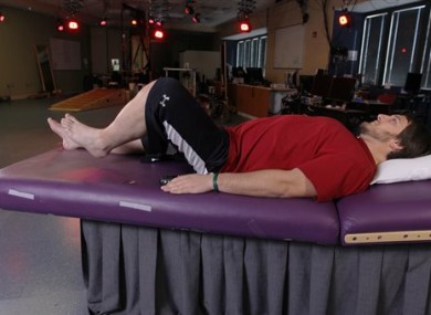 Kent Stephenson, the second person to undergo epidural stimulation of the spinal cord, voluntarily raises his leg while stimulated at the Human Locomotion Research Center laboratory.