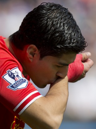 Forward thinking: Suarez says he's settled on Merseyside.