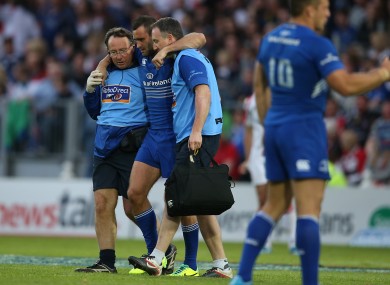 Kearney is helped off the RDS pitch last Saturday.