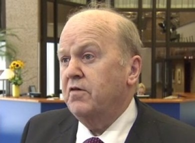 Michael Noonan speaking to reporters in Brussels yesterday.