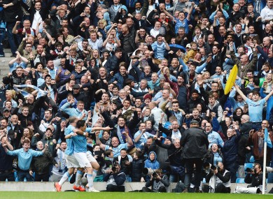 Manchester City's Samir Nasri (centre) celebtrates after scoring his side's first goal of the game.