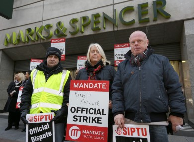 File: Derek Chervi, Helen Carey and Pat Hayden, at the Marks and Spencer's store on Mary Street in Dublin strike last December.