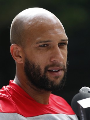 United States' goalkeeper Tim Howard talks to media members in Sao Paulo.