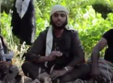 A screengrab from the video shows Nasser Mathuna (centre).